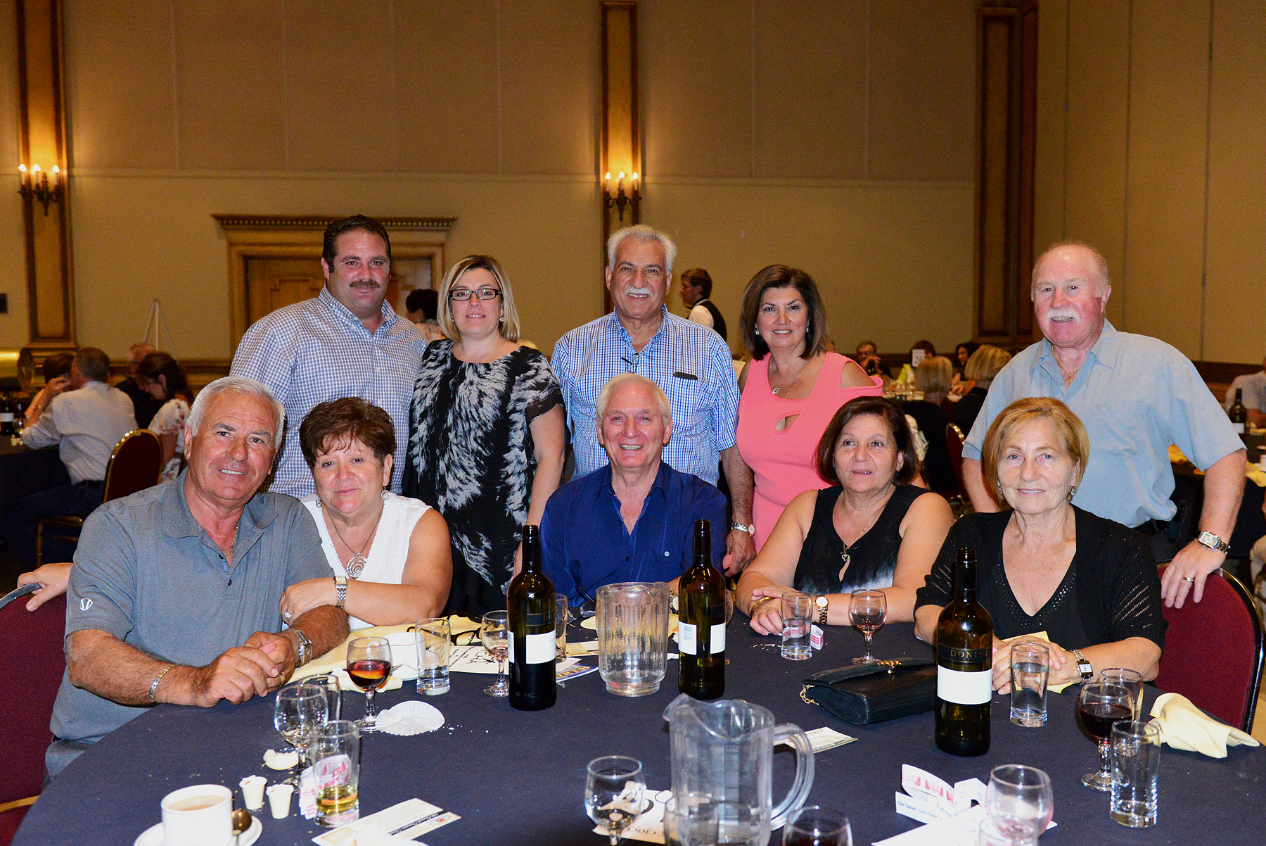 ICHA Summer Fundraiser guests sit for dinner