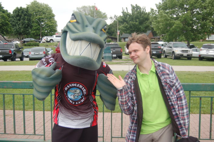 Cam Wells poses with gator mascot