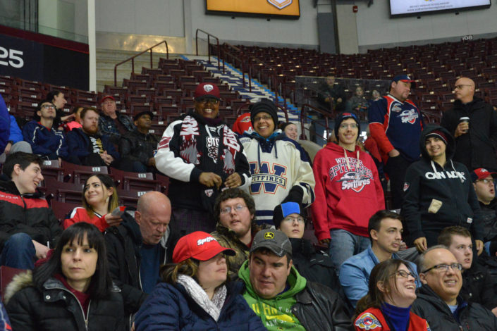 ICHA members sitting at Spitfires game