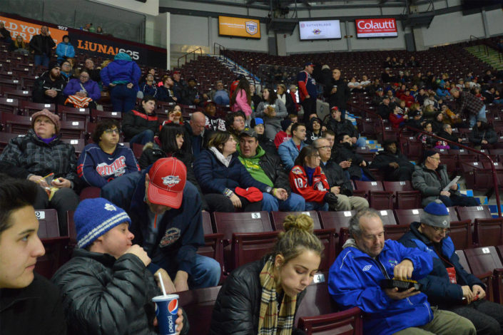 ICHA members sitting at Spitfires game