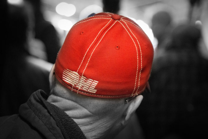 Spitfires fan in a red cap