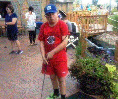 ICHA member prepares to swing golf club