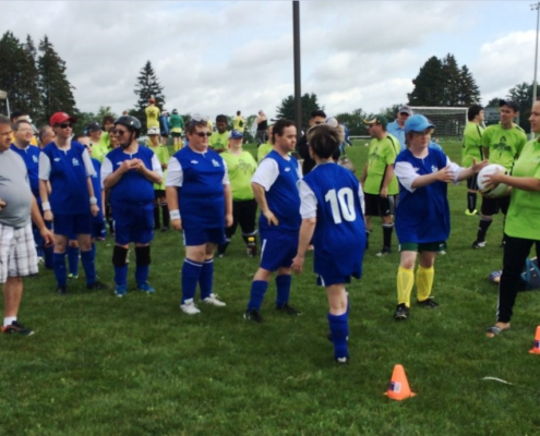 ICHA players on the field at SOO invitationaltournament in Woodstock